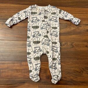 Caden Lane beige golf footed pajama onesie.